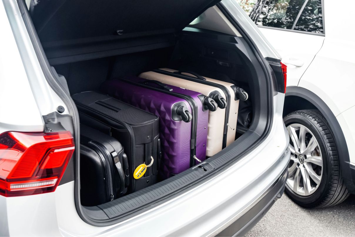 image of luggage inside car boot